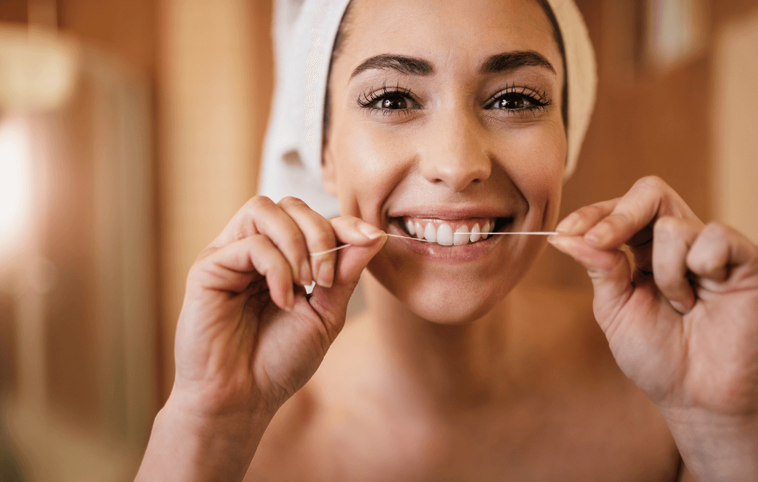 how to get something out of your teeth without floss